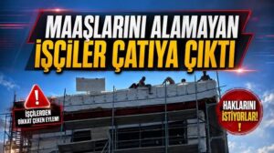 Maaşlarını alamayan işçiler çatıya çıktı